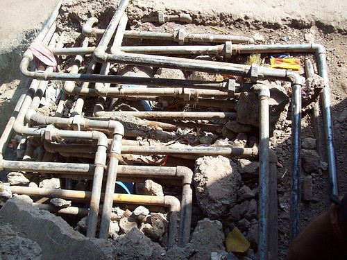 Network of pipes carrying fresh water to the houses. These pipes have all been laid out by local plumbers.