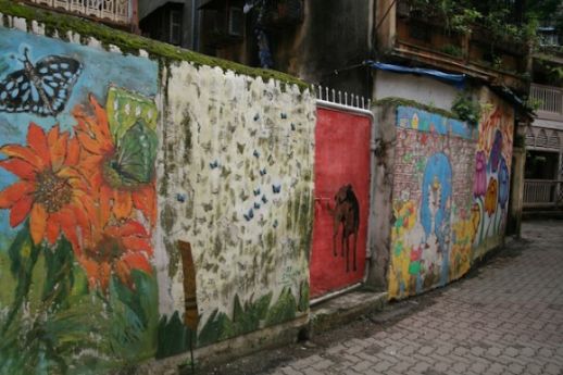 Colourful streets of Dharavi.(left) Street art in Khotachiwadi (right)