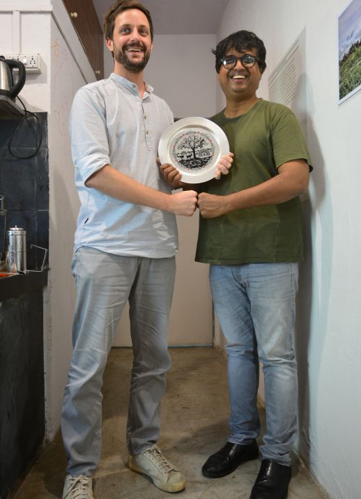 Matias & Rahul holding Swiss-India Friendship memento 