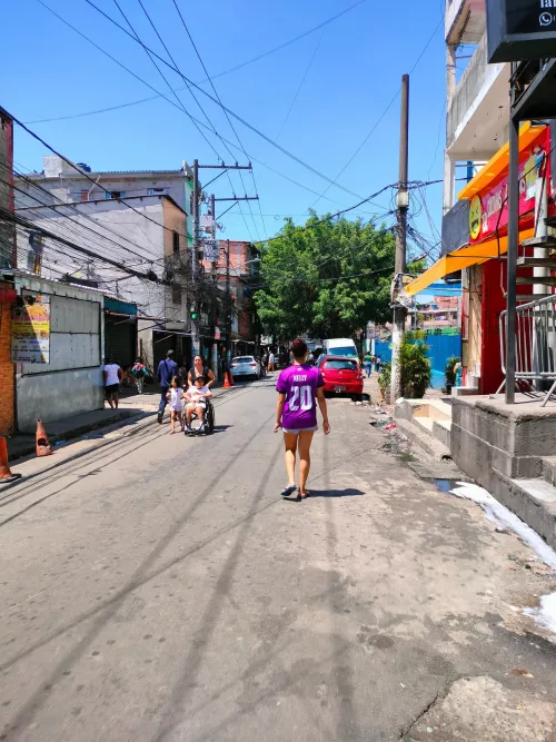 We recently got the chance to visit Paraisopolis, one of the largest homegrown neighbourhoods in São Paulo, Brazil, which was an abandoned half-built gated complex appropriated by people to fulfil housing needs. We were struck by the similar vibrant energy and form of housing in Dharavi and Paraisopolis. Both homegrown neighbourhoods - built by users to accommodate their needs. Both produced using the skills of local contractors and artisans. 

As we walked the streets of Paraisopolis, guided by old-time urbzian @botton_1979 , who spent almost a decade working here, he reminisced about how in 2012, urbz facilitated a knowledge exchange between contractors in Paraisopolis and Dharavi. During their visit to Paraisopolis in 2014, the urbz team befriended mechanic turned artist @berbelapaz and local building contractor and artisan Ataide, who visited Dharavi as part of the exchange. More than a decade later, we were thrilled to meet some of these collaborators and ended our visit with one of the best meals in São Paulo, served hot and fresh in the streets of Paraisopolis! 

Slide 1- Streets of Paraisopolis - the gridiron layout is a relic from the gated complex, and as far as it had progressed, the construction of the complex was abandoned soon after

Slide 2 - Residents have incrementally built shops and housing, turning it into a vibrant neighbourhood

Slide 3 - urbz team in Paraisopolis with artist Berbela and a travelling photo exhibition which collapsed the distance between Dharavi and Paraisopolis, 2012

Slide 4 - After more than a decade, the photos are still on display in Berbela’s studio

Slide 5 - Berbela and the urbz team from Mumbai

Slide 6 - Visit to see one of the exposed brickwork projects done by Ataide on the rooftop of a community centre

Slide 7 - Lunch in Paraisopolis with @botton_1979 and a massive fried Tilapia! 

#mumbaitosaopaulo #dharavitoparaisopolis
#urbz #homegrown