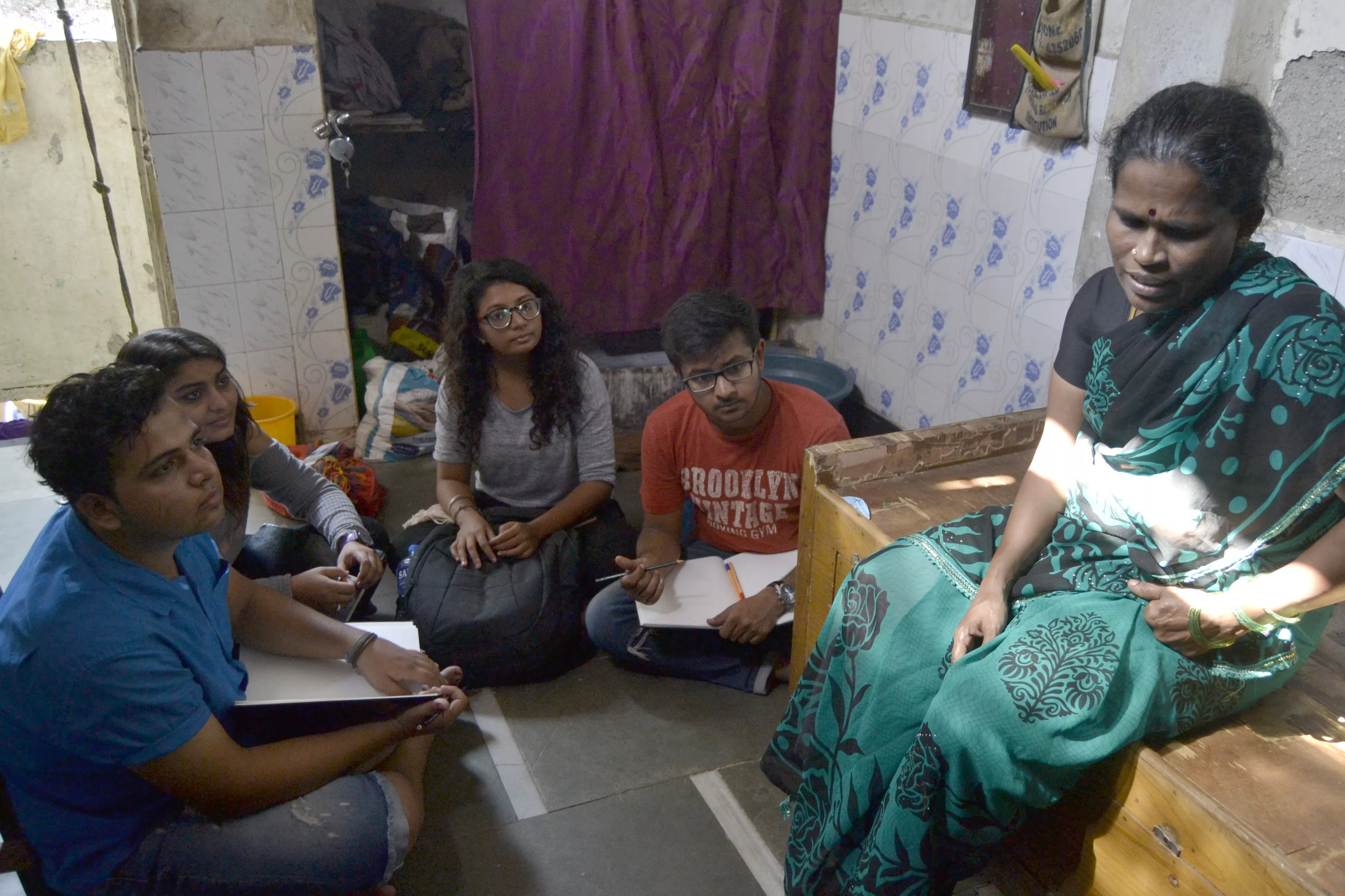 Team Idli in conversation with the Jeyanti who makes all the batter and preparation for the day’s work.