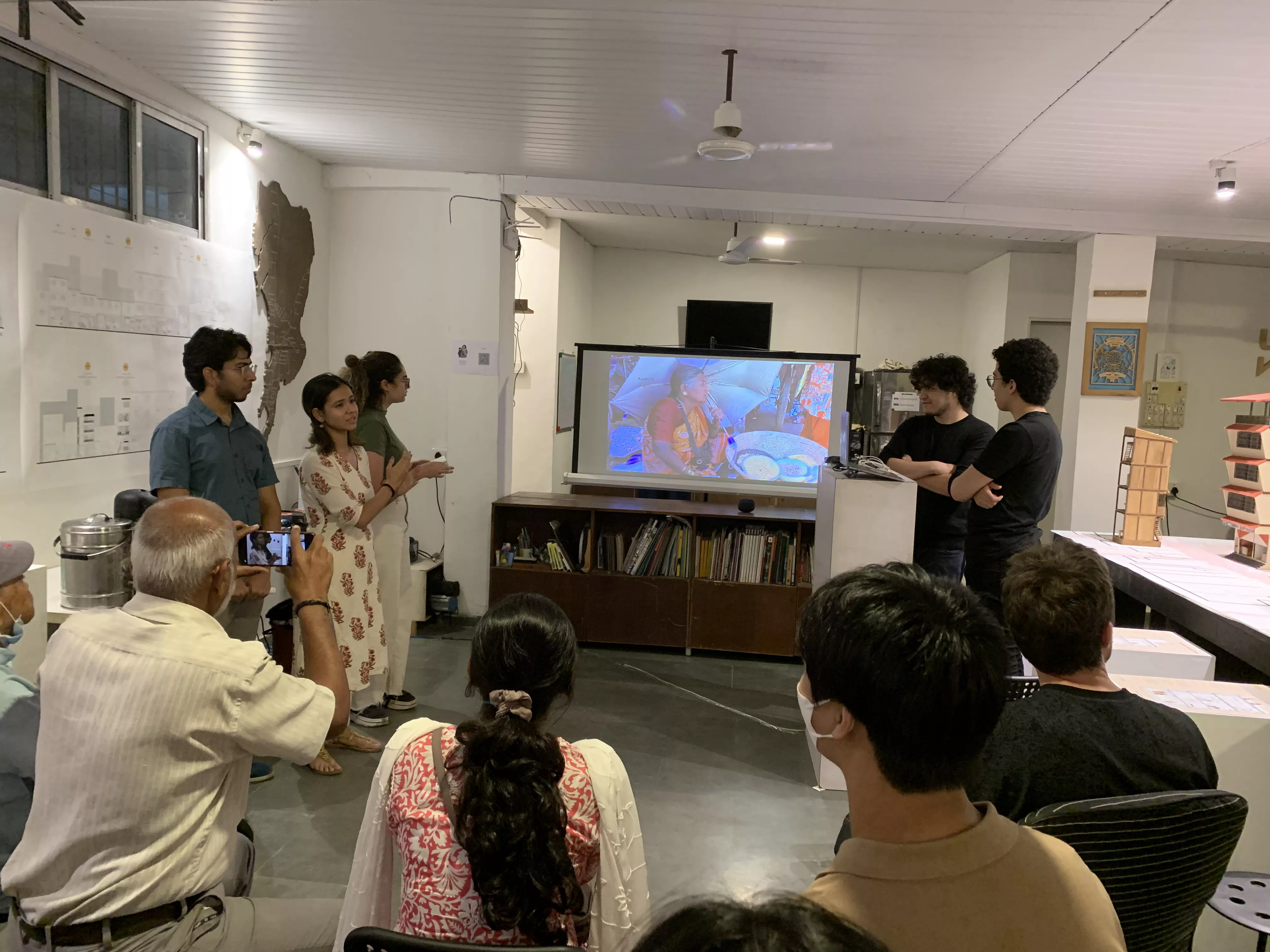 NYUAD students presenting their projects at the Homegrown street exhibition