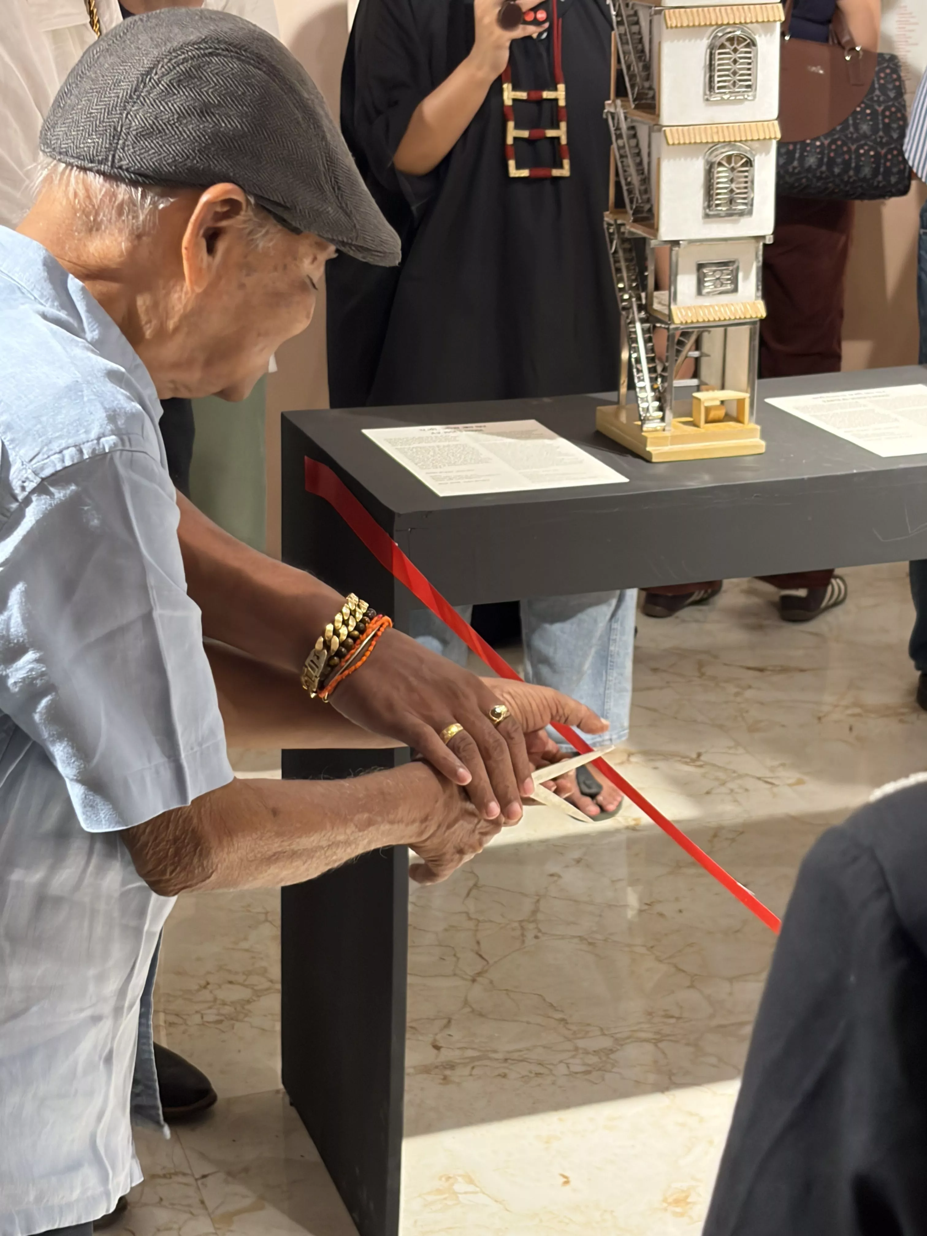 Bhau Korde, longtime Dharavi resident and award winning social worker inaugurates the exhibition 