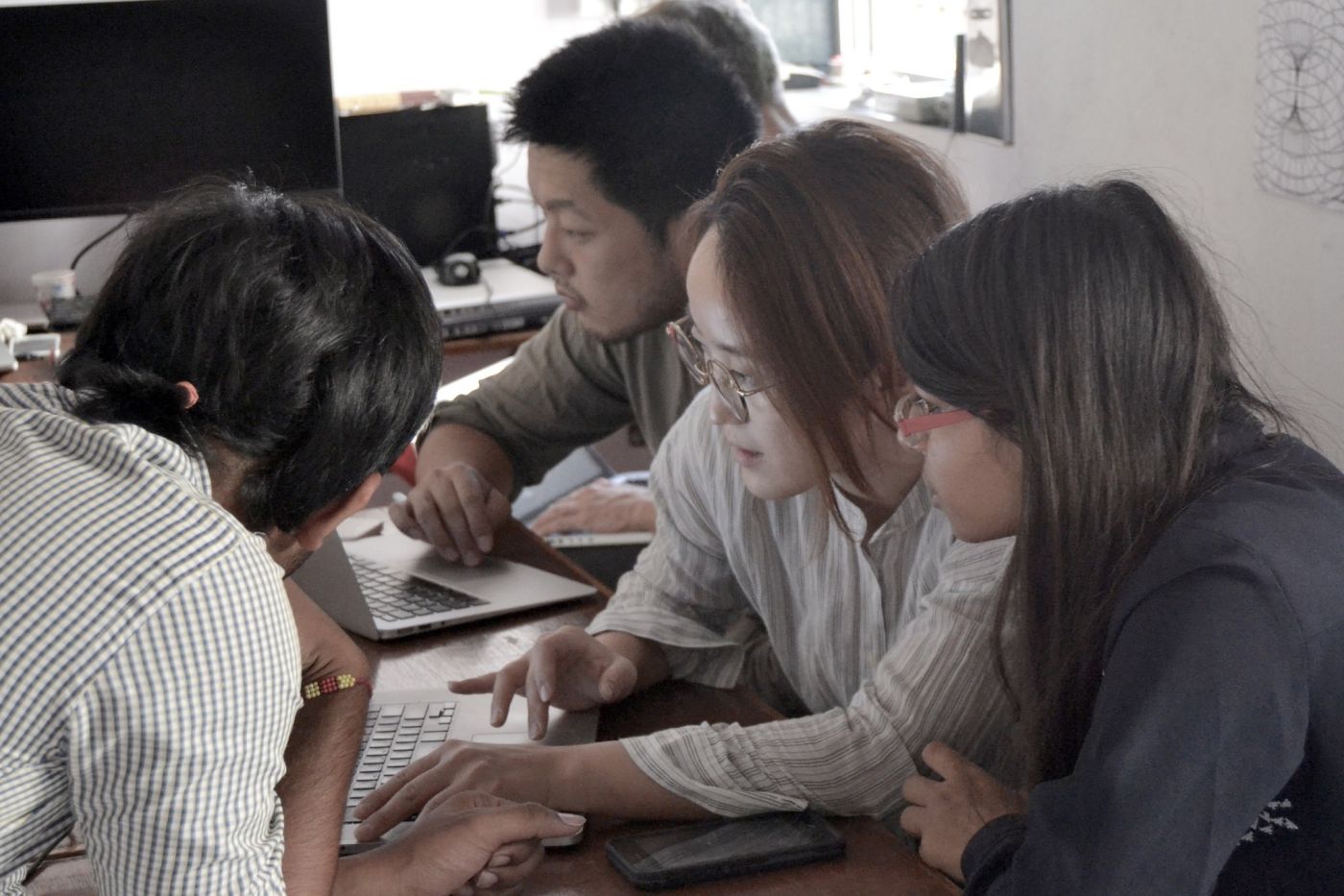 Participants back at the office to discuss ideas and follow their trails to other parts of the city.