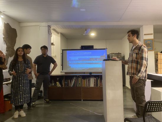 (NYUAD students presenting project briefs at the Homegrown street exhibition)