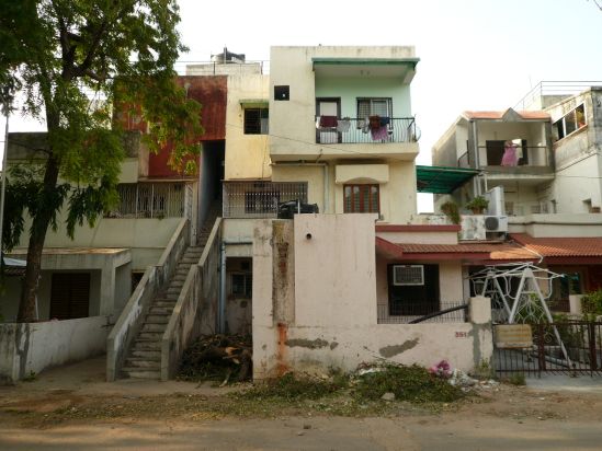 The LIC Colony in Ahmedabad. This project was executed in the 1980s by B.V. Doshi, one of India's most prominent architects. B.V. Doshi worked with Le Corrbusier for 7 years in France and assisted him in some of his Indian projects. The LIC colony was designed for mixed-income groups, and allowed residents to transform the original architecture to accommodate their needs, means and aspirations. Most units have been completely altered over the years, producing a diverse neighborhood. 