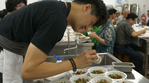 Chef Kim prepares for a final meal with local herbs and ingredients. 