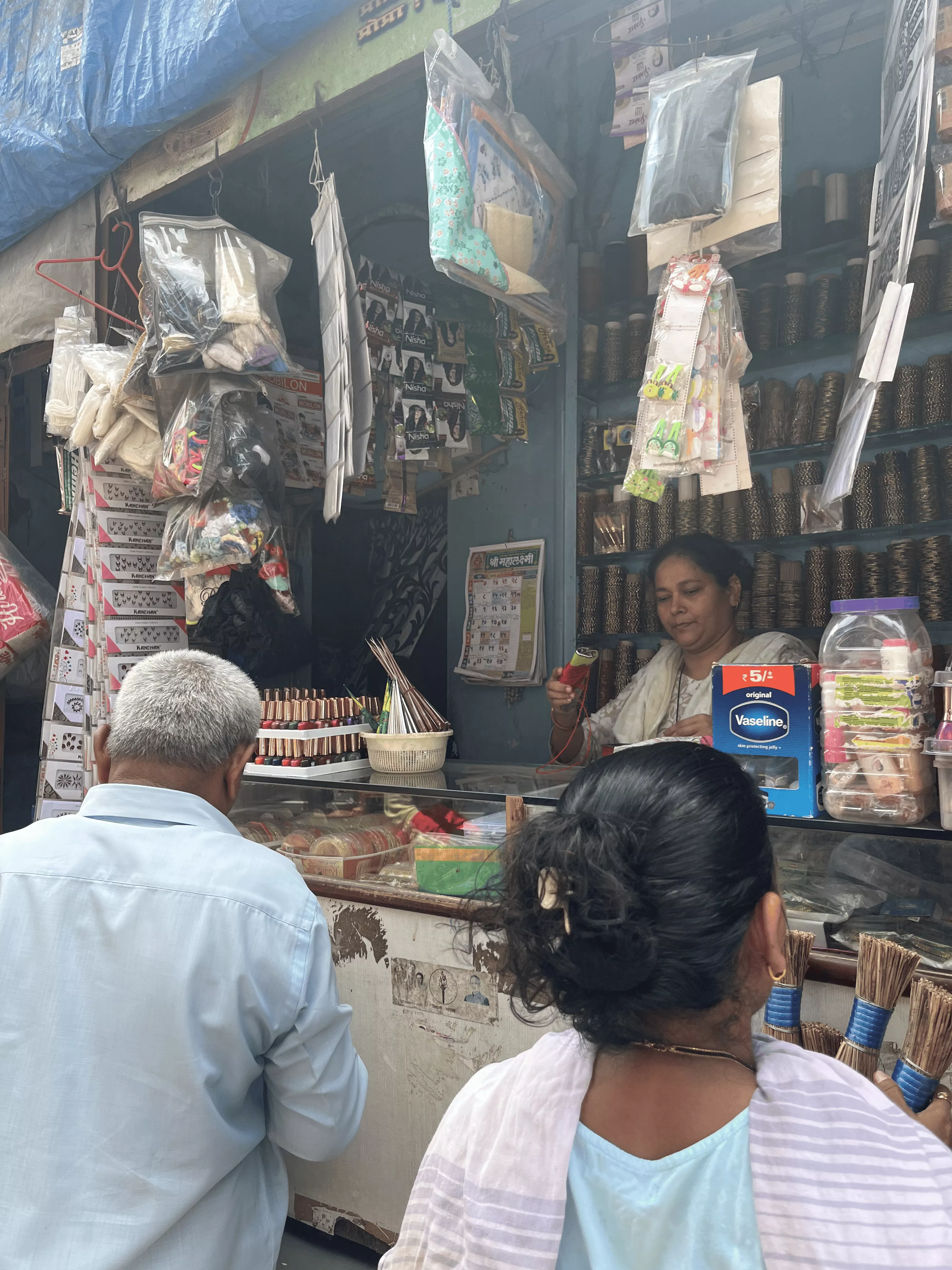 Customers at Hasmat's shop.