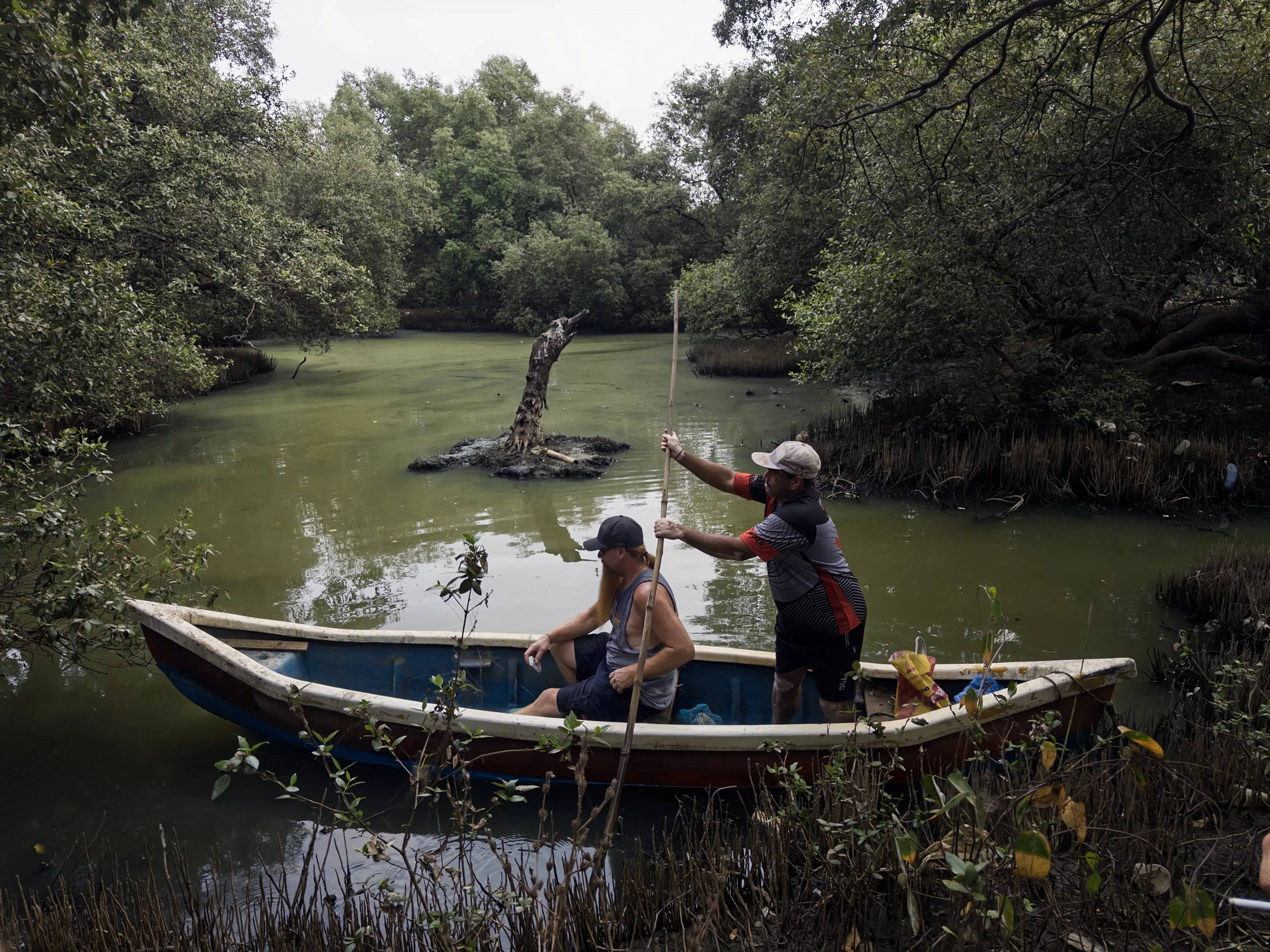 1. Wilson Koli takes the Sullivan crew to visit his pond
