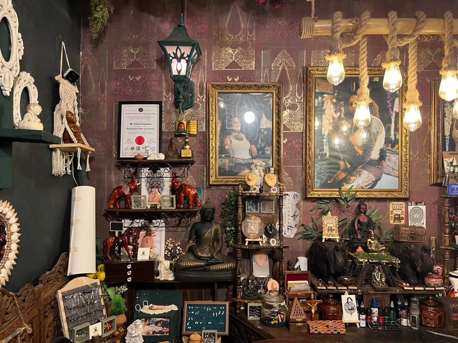 The studio decorated with memorabilia, tattoo flashes, piercing studs and trinkets.